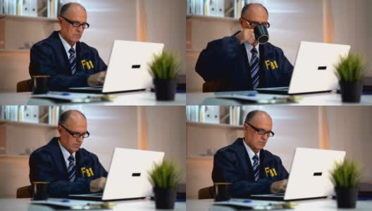 侦探使用笔记本电脑高清在线视频素材下载