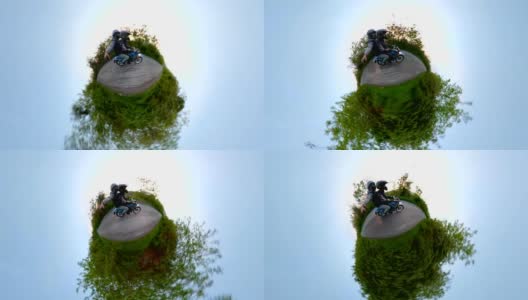 无忧无虑的男人骑着摩托车带着360度相机高清在线视频素材下载