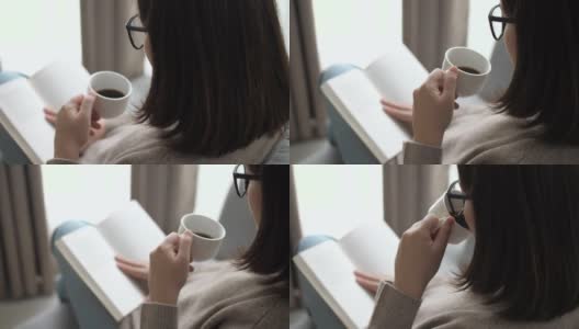 女人在放松的时候在家看书喝咖啡高清在线视频素材下载