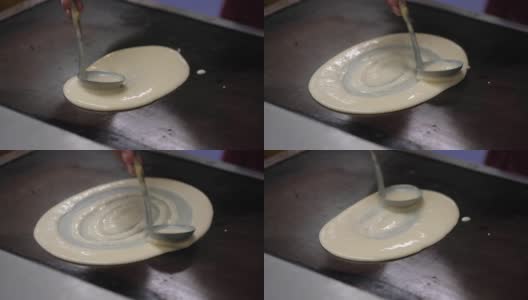在热锅上做泰国煎饼的特写高清在线视频素材下载