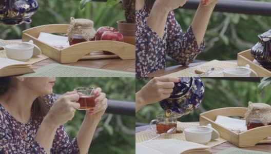 头部特写的西班牙裔年轻女子在户外阳台喝一杯热茶高清在线视频素材下载
