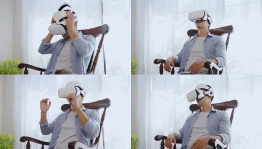 西班牙裔男子戴着虚拟现实耳机在家观看网络空间高清在线视频素材下载