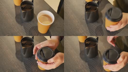 咖啡师用纸杯泡了两杯咖啡，合上盖子端了上来高清在线视频素材下载