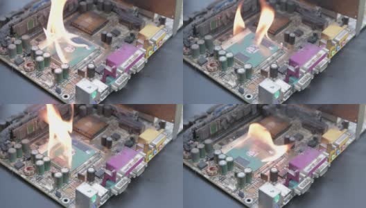 电脑主板、电路板着火要烧，有火焰。短路，烧毁电脑芯片高清在线视频素材下载