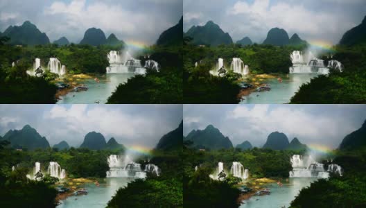 彩虹瀑布在越南Bangioc瀑布和德天瀑布在中国鸟瞰，位于边境附近，人们可以看到这两个国家的瀑布。高清在线视频素材下载