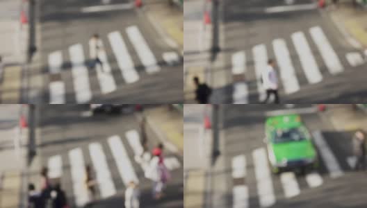 4K:模糊俯视城市居民正在行走高清在线视频素材下载
