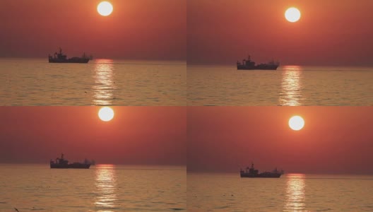 平静的北海上日落时的渔船高清在线视频素材下载