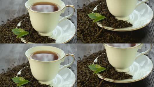 茶托上的瓷杯里装着热茶高清在线视频素材下载