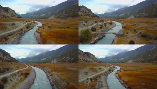 无人机俯瞰喜马拉雅山脉的河流，俯瞰尼泊尔高清在线视频素材下载