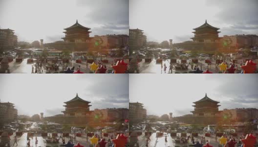 日落时分，中国陕西西安钟楼周围繁忙的交通高清在线视频素材下载