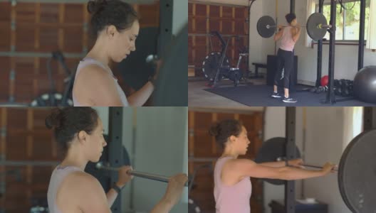 强壮的民族妇女在家庭健身房用杠铃锻炼高清在线视频素材下载