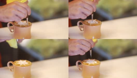 咖啡师制作拉花艺术的慢动作高清在线视频素材下载