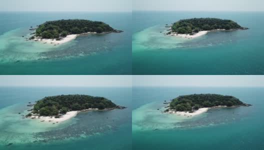 无人机飞越海洋到热带豪华私人岛屿。泰国罗勇的Koh Munnork。高清在线视频素材下载