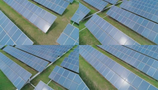 太阳能电池板鸟瞰图农场太阳能电池与太阳反射。可再生绿色替代能源概念。相机移动离开高清在线视频素材下载