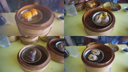 蒸开的点心在不同的层次上是中国传统食物高清在线视频素材下载