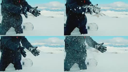 SLO MO滑雪板手拍下手套上的雪高清在线视频素材下载