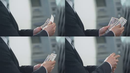 男子准备兑换日元在银行分行，工资在外币高清在线视频素材下载