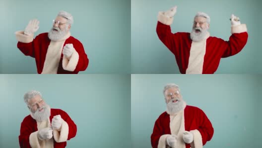 滑稽快乐的圣诞老人把五彩纸屑吹向空中。欢喜,笑了。蓝色背景高清在线视频素材下载