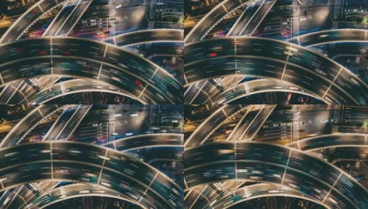 T/L无人机视角的立交桥和城市交通在夜间高清在线视频素材下载