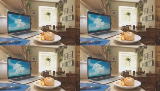带笔记本电脑的厨房场景高清在线视频素材下载