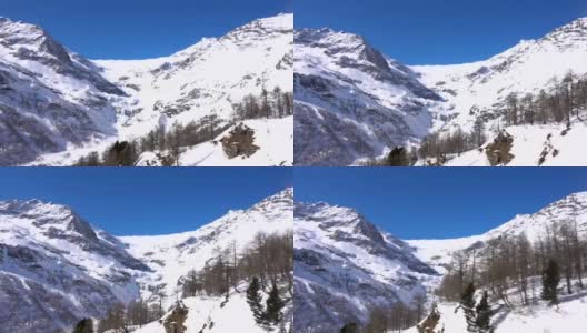 冬季阿尔卑斯山景观从红色火车贝尔尼纳铁路高清在线视频素材下载