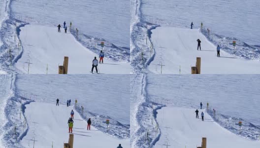 在泽马特村的马特霍恩克莱因滑雪场滑雪的滑雪者高清在线视频素材下载