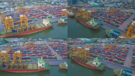航拍东南亚工业港口与集装箱船在夜间的延时或延时高清在线视频素材下载