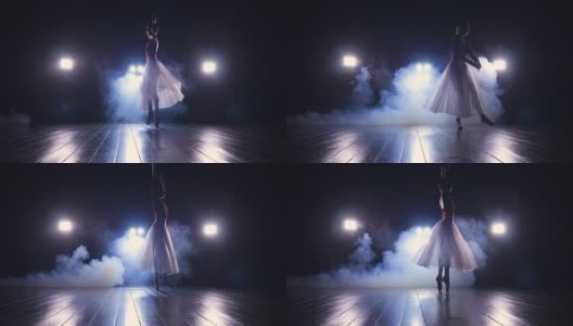 芭蕾舞女演员的剪影在舞台上跳舞。高清。高清在线视频素材下载