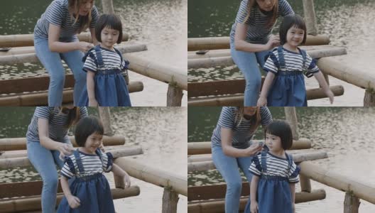 年轻的母亲和女儿享受庞翁，Mae Hong Son省在泰国高清在线视频素材下载