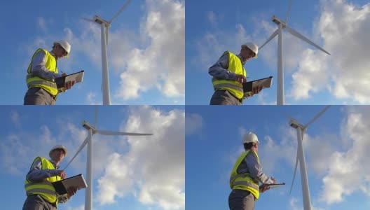 风力发电员工在工厂检查时做记录高清在线视频素材下载