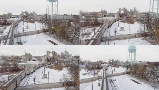 冬天雪地里的火车车场高清在线视频素材下载