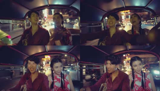 亚洲夫妇旅游骑嘟嘟在曼谷高清在线视频素材下载