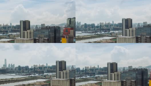时间流逝俯瞰香港现代摩天大楼的天空白云。港口高清在线视频素材下载