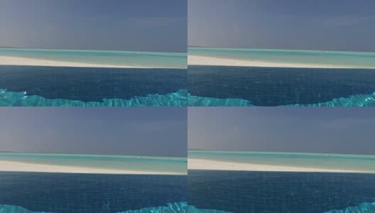 马尔代夫海滩上的淡水游泳池高清在线视频素材下载