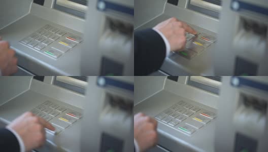 商人在ATM、银行服务、金融键盘上输入自己的密码高清在线视频素材下载