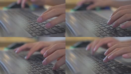 特写打字，触摸笔记本电脑的键盘高清在线视频素材下载
