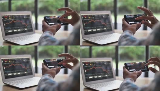在智能手机上交易股票市场高清在线视频素材下载