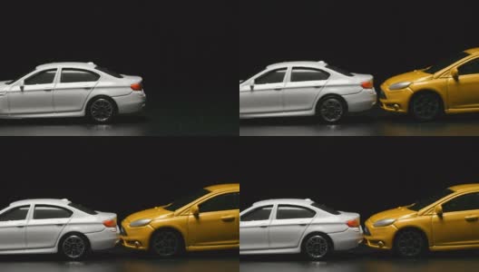 事故:黄色玩具模型汽车与白色玩具汽车相撞(慢镜头)高清在线视频素材下载