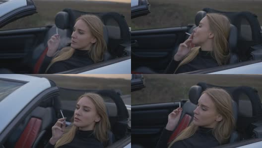 年轻女孩在敞篷车里抽烟高清在线视频素材下载