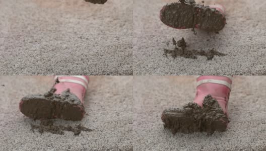 泥泞的靴子落到地毯上的慢动作高清在线视频素材下载