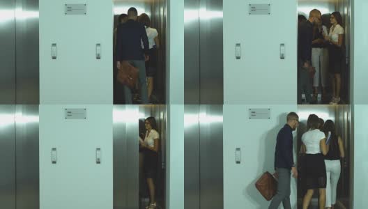 一群商人从电梯里出来高清在线视频素材下载
