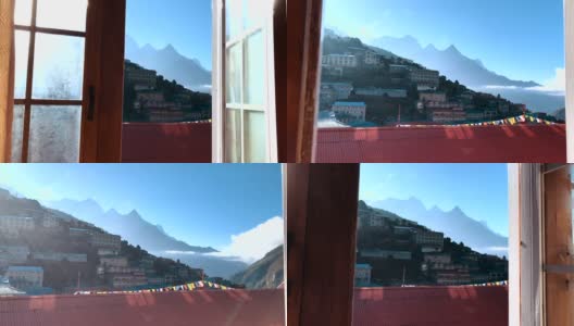 尼泊尔纳姆切巴扎镇，有人打开酒店房间的窗户高清在线视频素材下载