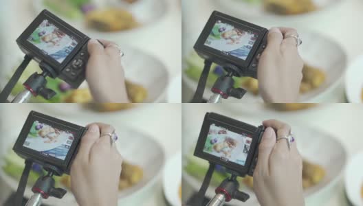 拍摄过程中食物在摄像机上显示的视频高清在线视频素材下载