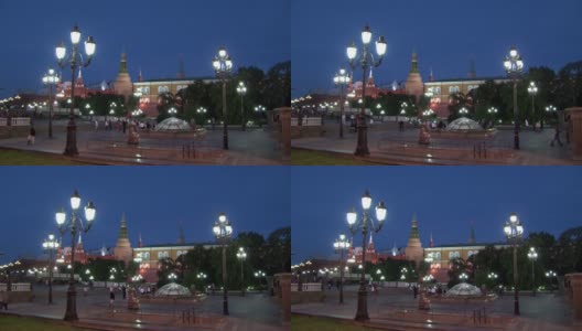 夜晚，莫斯科红场上，人们走在克里姆林宫附近。高清在线视频素材下载