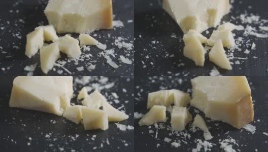 新鲜的三角形法国美味帕尔玛干酪块放在木板上高清在线视频素材下载