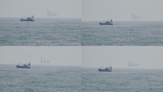 北海的渔船和石油平台高清在线视频素材下载