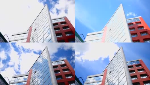 现代建筑用玻璃和天空中云朵的倒影高清在线视频素材下载