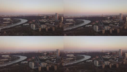 俄罗斯日落天空莫斯科城市景观河流和大学交通街道空中全景4k高清在线视频素材下载