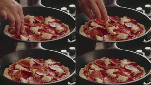 在家庭厨房里准备自制的马苏里拉披萨高清在线视频素材下载