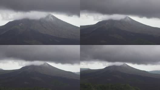 印度尼西亚巴图尔火山和湖泊上空的雾和云高清在线视频素材下载